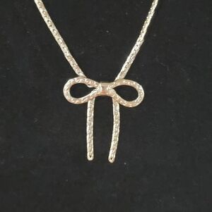 Avon Gold-tone Bow Pendant Necklace